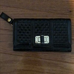 Elliot Lucca black patten leather wallet.